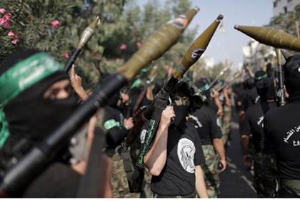 hamas warns israel not to respond to teenage boys murders