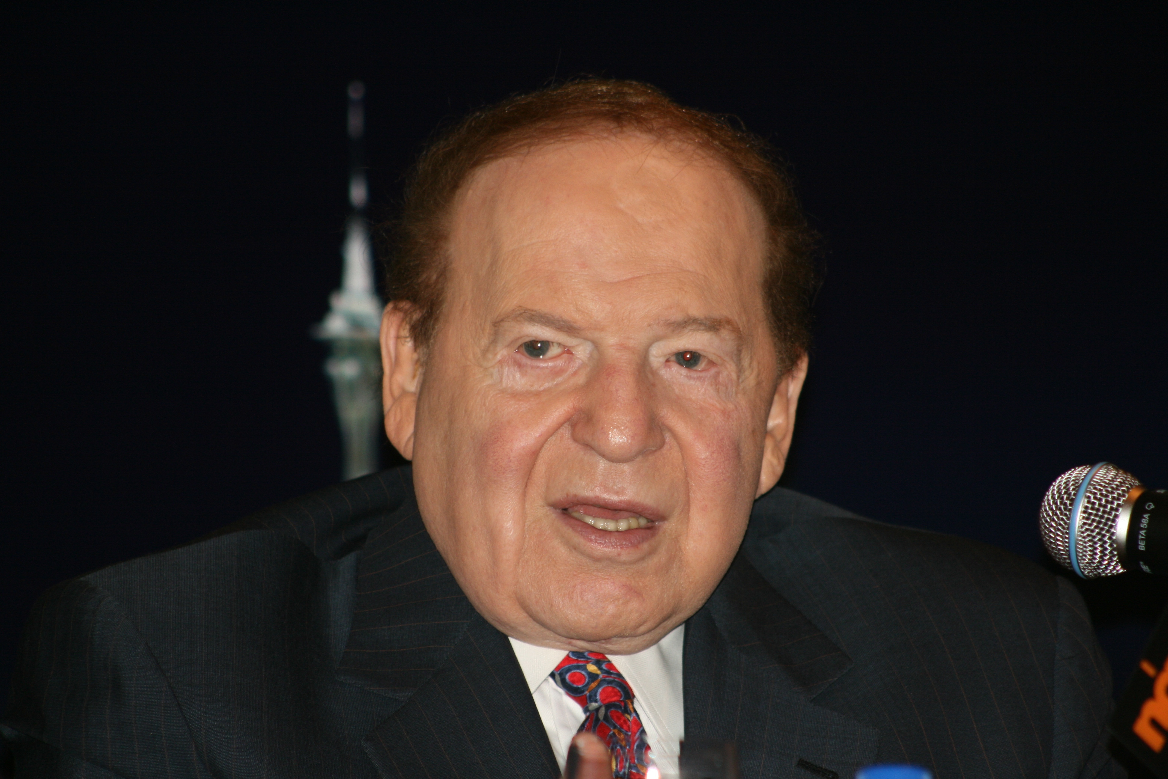 adelson to buy israeli paper, website