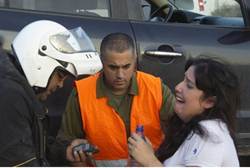 woman reacts to rocket attack in ofakim on her car